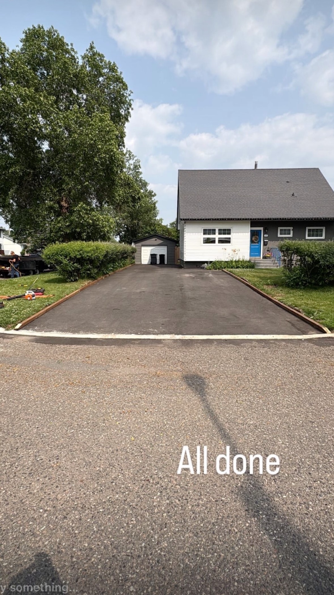 Completed new asphalt driveway at a residential home